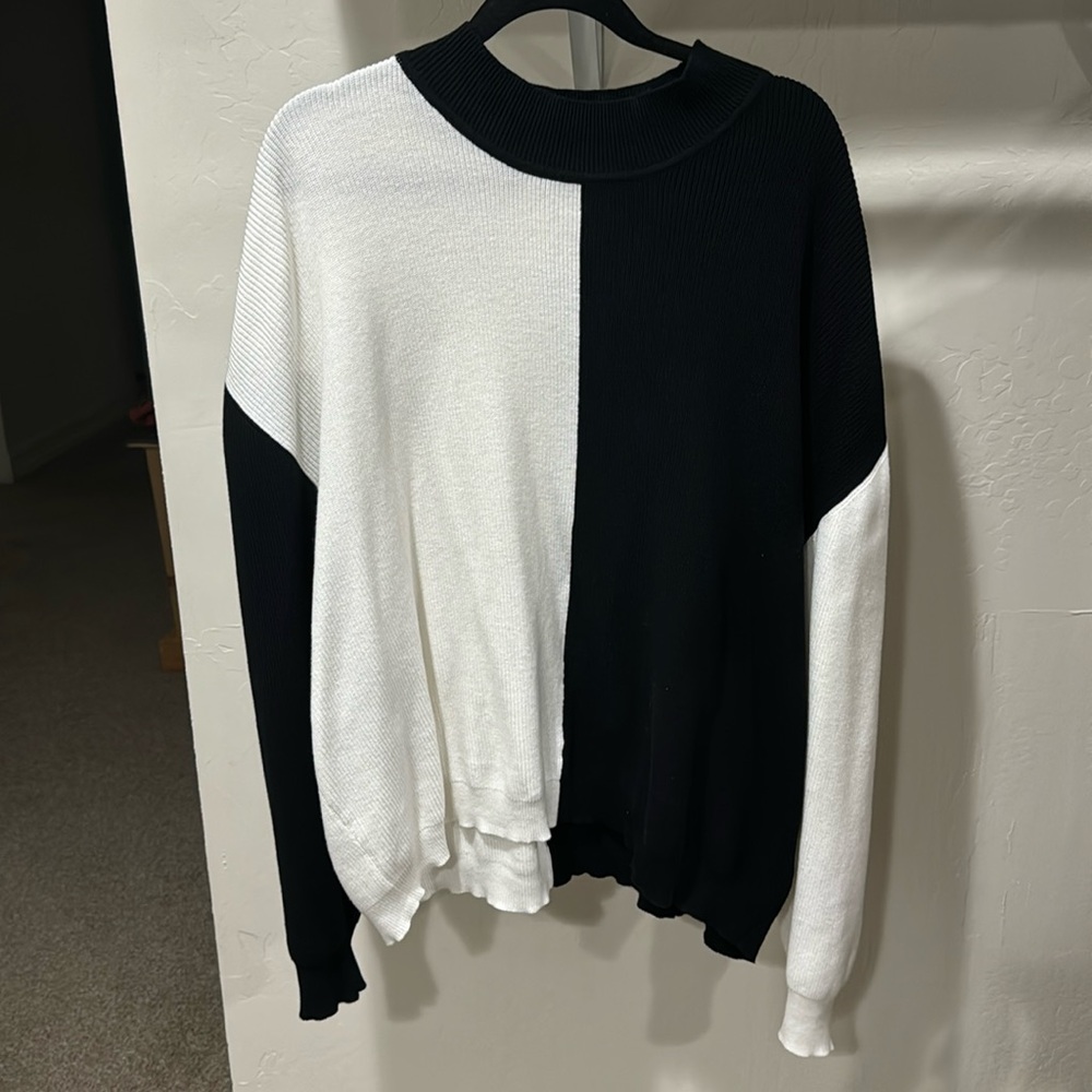 fashion brand company black and white sweater